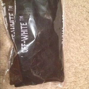Off white socks that have never been used.